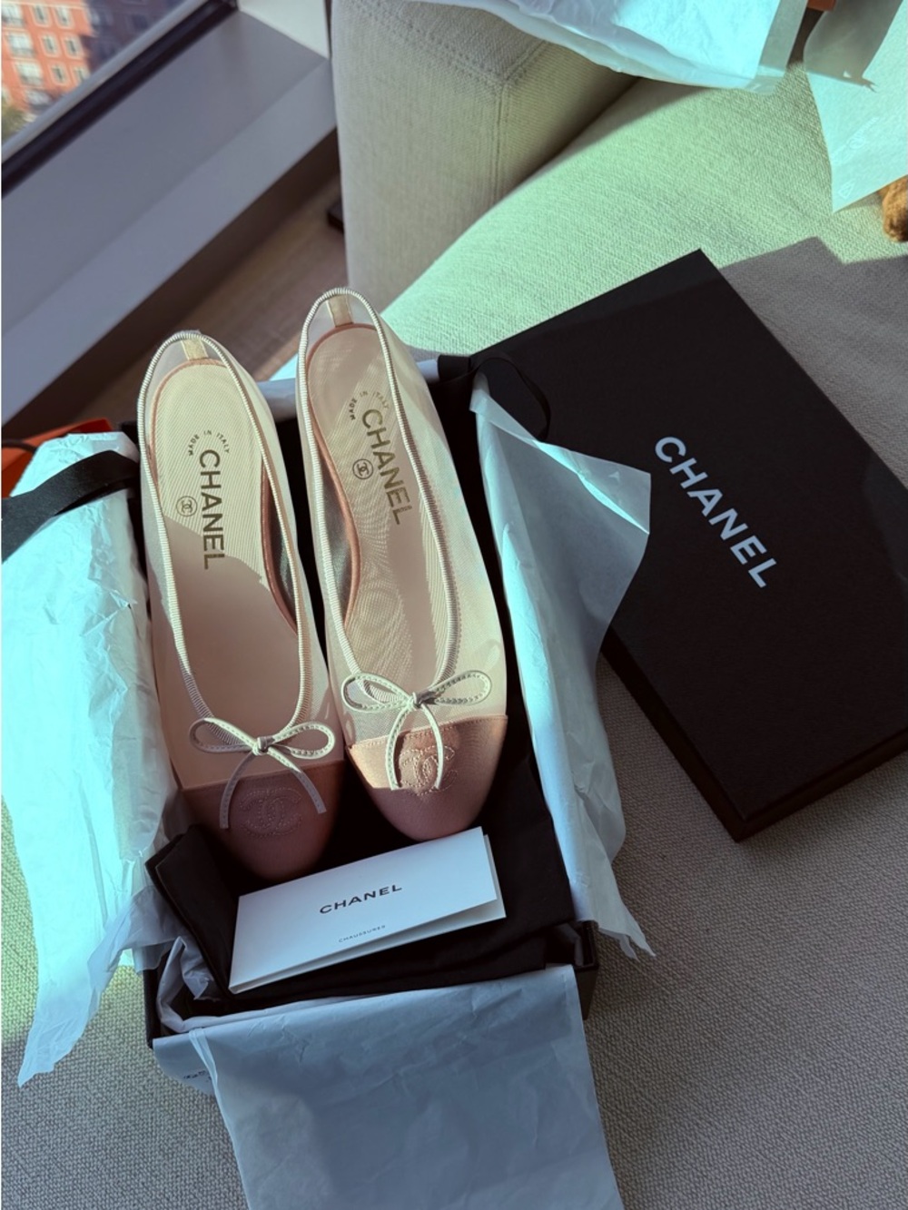 CHANEL Pink Leather Ballet Flats with Bow Accent